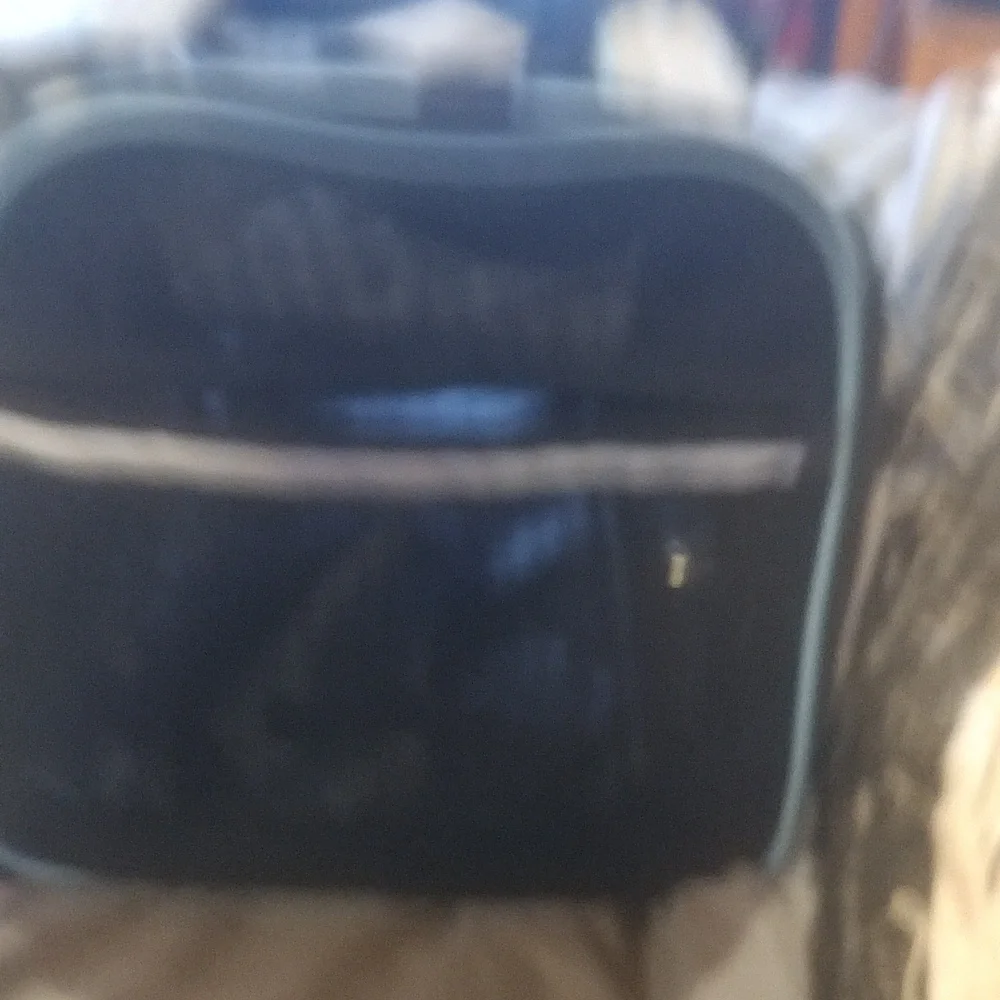 A small dog carrier excellent condition never used